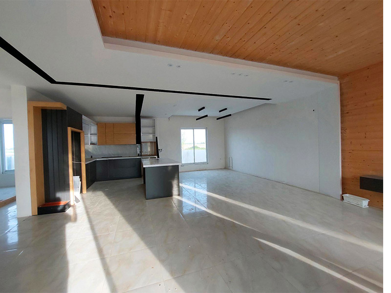 تصویر یک ویلای نما مدرن و محوطه سازی شده با موزاییک و چمن مصنوعی